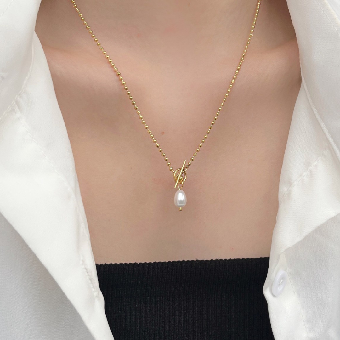 Halskette mit Perlenanhänger und Kugel - Volura