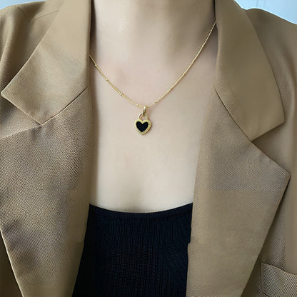 Halskette mit doppelseitigem Herz-Anhänger - Volura